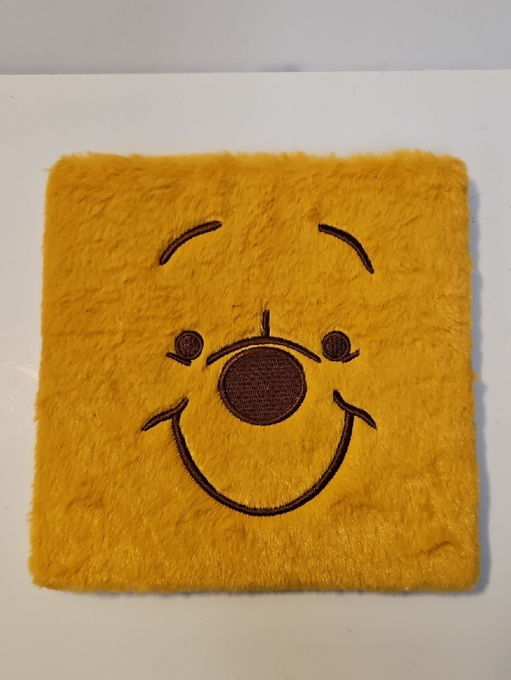 DISNEY WINNIE THE POOH 16 COLOR EYESHADOW PALETTE WITH FURRY COVER.
